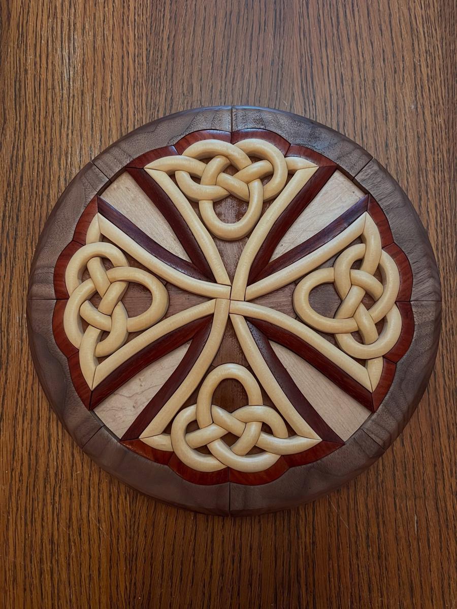 Celtic knot intarsia medallion in maple, padauk and walnut