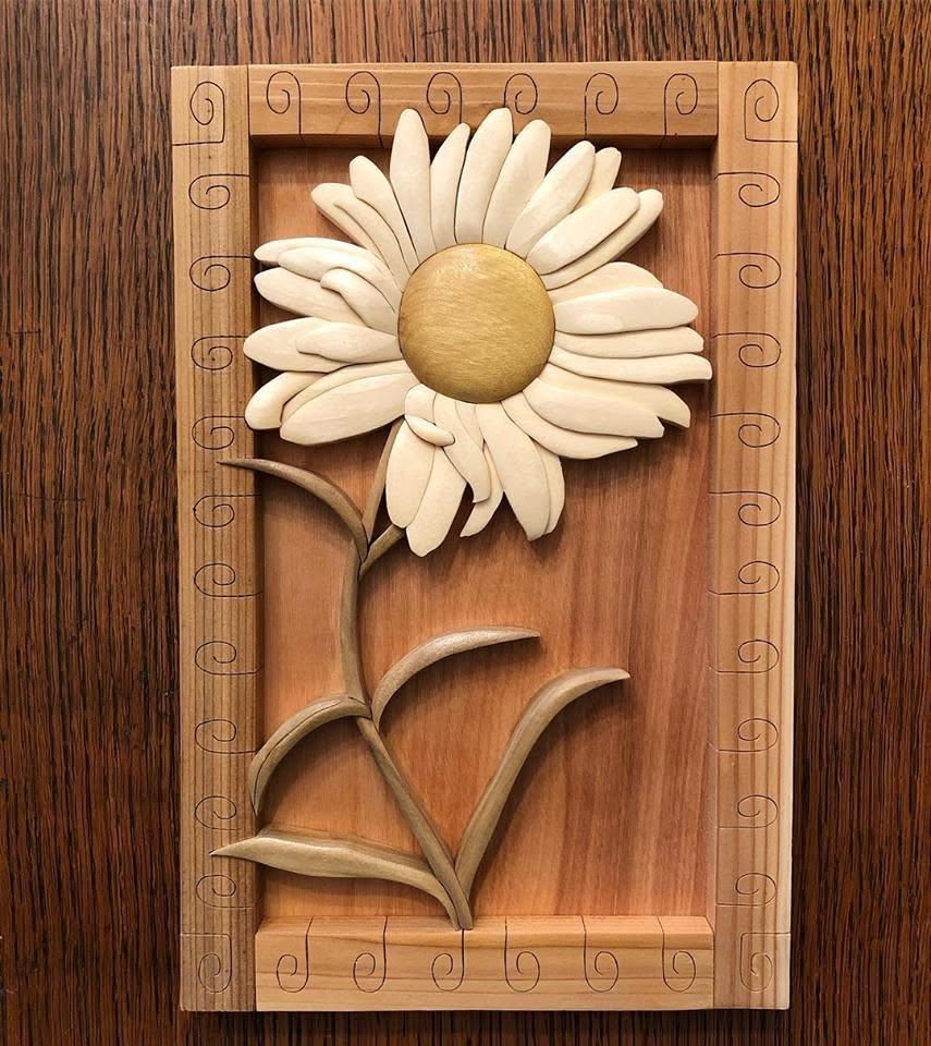 Intarsia daisy wall hanging in a cedar frame