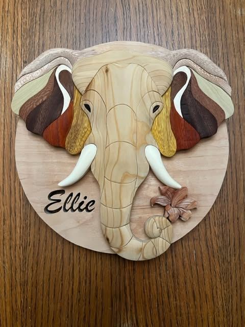 Intarsia elephant with the name Ellie, a custom project